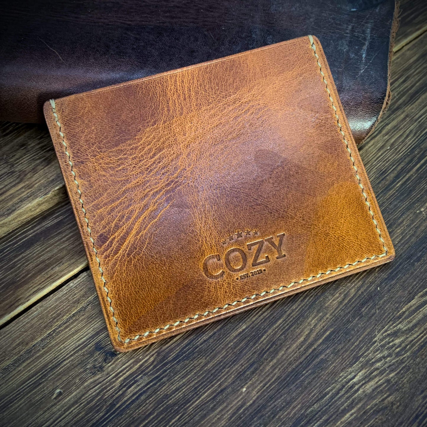 COZY Handmade Everyday Card Wallet in Military 102 showing embossed COZY Est. 2013 stamp — full grain veg tan leather handcrafted in Singapore