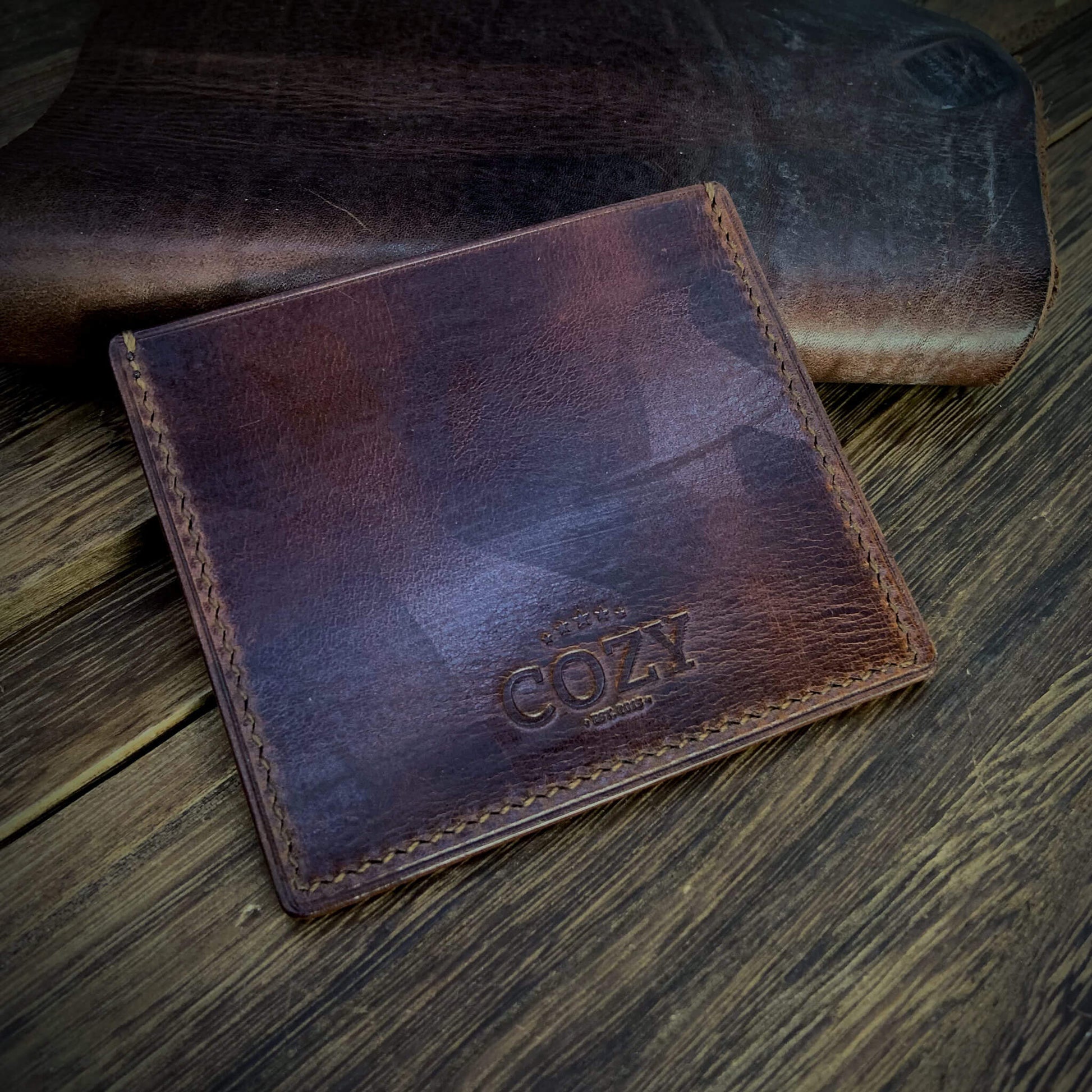 COZY Handmade Everyday Card Wallet in Military 103 showing embossed COZY Est. 2013 stamp — full grain veg tan leather handcrafted in Singapore